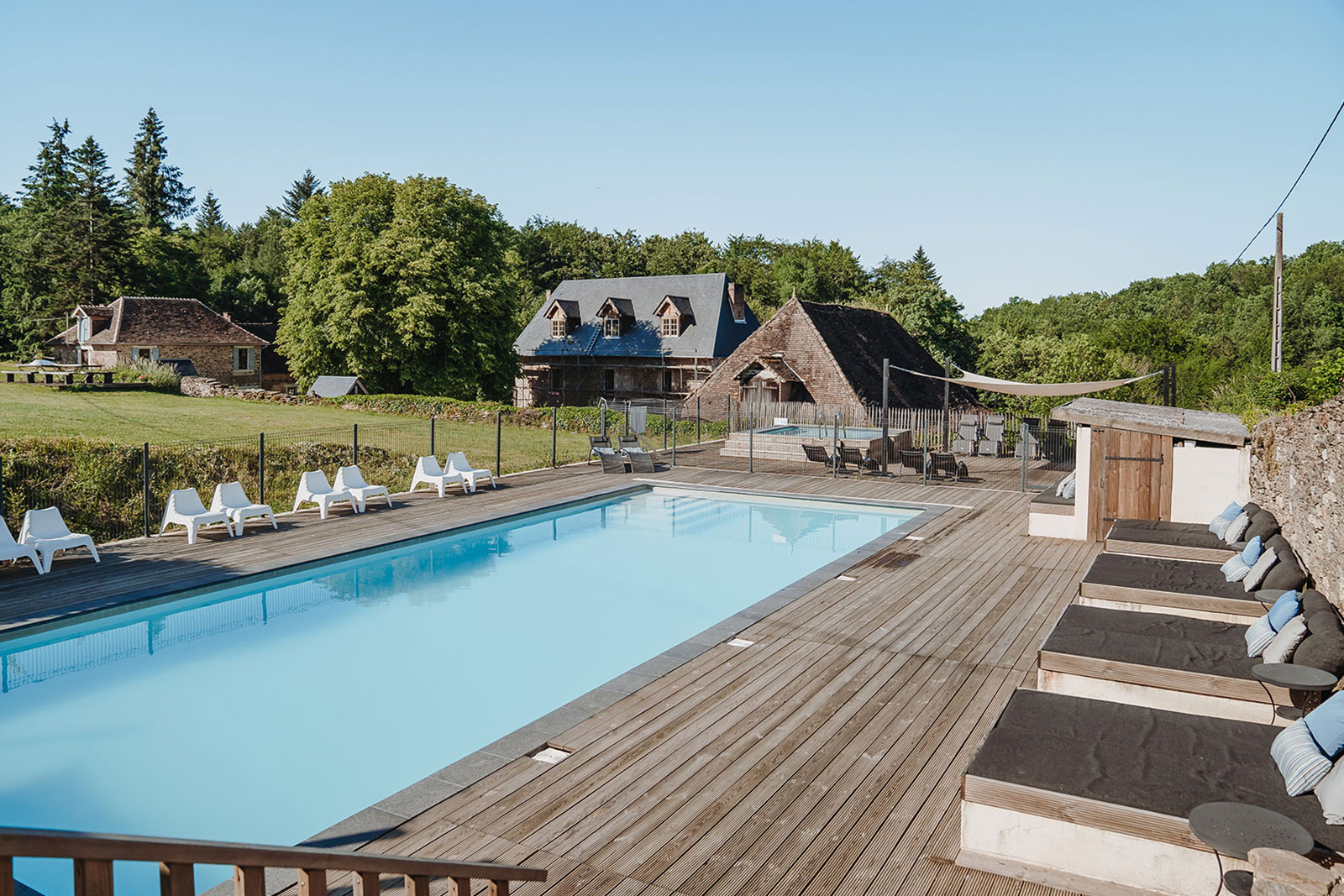 Interior atmosphere holiday home LOTT Coussac-Bonneval outside communal swimming pool on holiday domain in the Haute-Vienne France